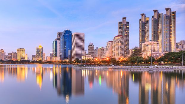 Modern buildings in office district at twilight in Bangkok, Thailand.