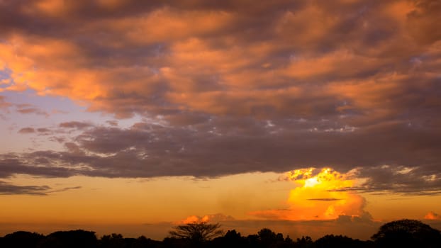 Dramatic twilight sunset and clouds at dusk background.