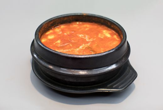 Traditional Korean Kimchi soup isolated on white background.