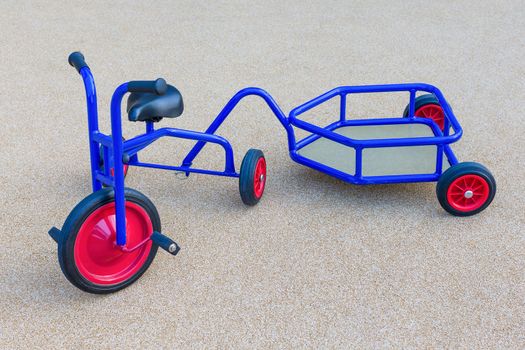 Tricycle for kids of children in playground.