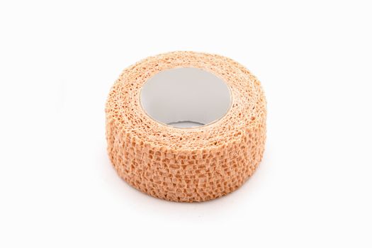 Isolated medical gauze roll bandage on white background.