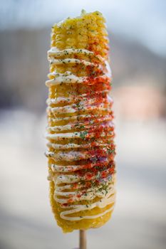 Roasted or grilled sweet corn on cob.