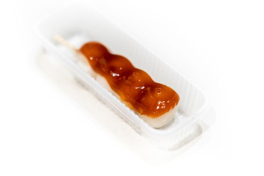 Isolated shot of Dango, Japanese traditional dessert, on white background.