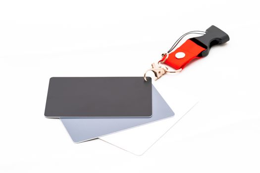 Isolated grey card target for white balance isolated on white background.