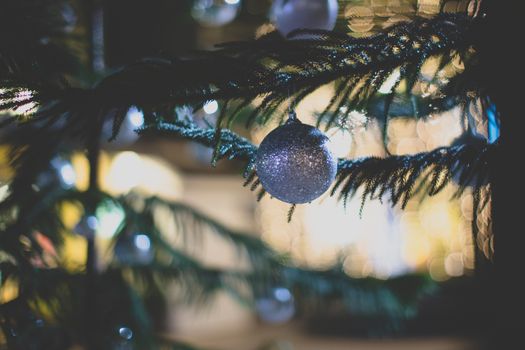Background of Christmas tree with vintage film look.