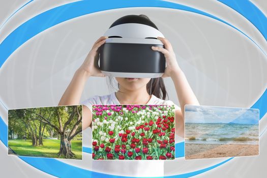 Concept of VR or virtual reality for travelling to places illustrated by Asian child wearing VR headset.