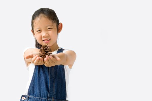 Studio shot of organic farming concept, Asian child farmer, isolated on white background.