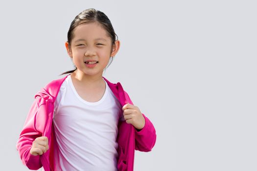 Studio Shot of Asian kid in sweater isolated on white background.