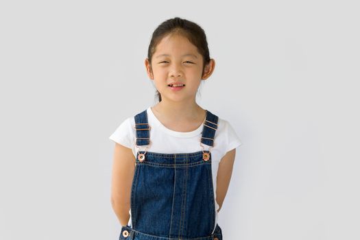 Studio shot of organic farming concept, Asian child farmer, isolated on white background.