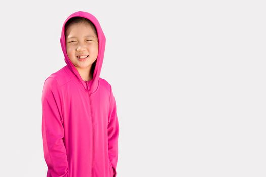 Sporty concept illustrated by studio shot of Asian child in sweater isolated on white background.