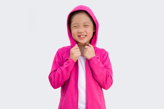 Studio Shot of Asian child in sweater isolated on white background.