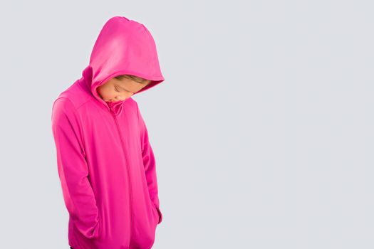 Studio Shot of Asian kid in sweater isolated on white background.