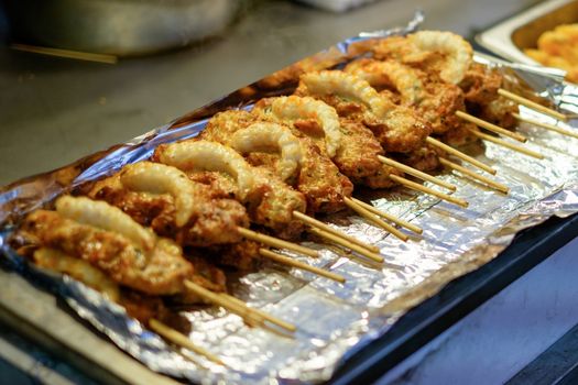 Korean shrimp deep fried tempura on skewer.
