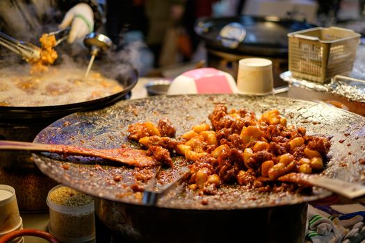 Korean style fried chicken with spicy sauce.