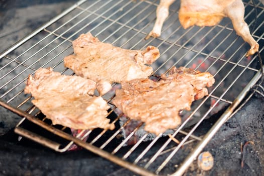 Grilled pork with smoke, street food style.