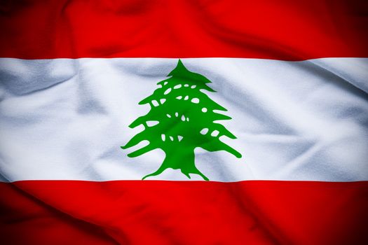 Wavy and rippled national flag of Lebanon background.