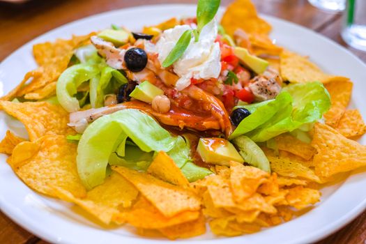 Traditional Mexican style vegetable salad with nacho.
