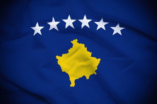 Wavy and rippled national flag of Kosovo background.