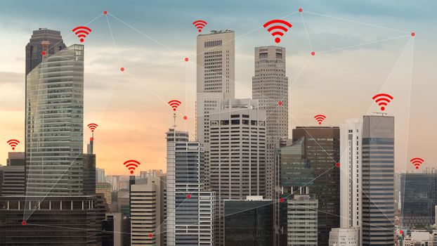 Concept of IOT and smart city illustrated by wireless networking and Wifi icon.