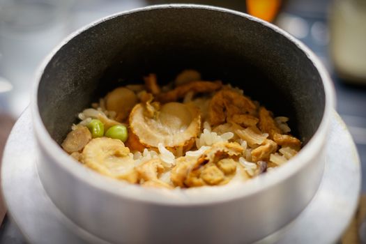 Traditional Japanese cuisine, baked scallop rice pot.