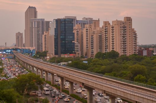 New Delhi, India, 2020. Aerial shot of Rapid metro tracks in urban areas of New Delhi NCR, Gurugram, Noida. A useful addition to existing DMRC rail network. DMRC is closing metro service due to covid-19