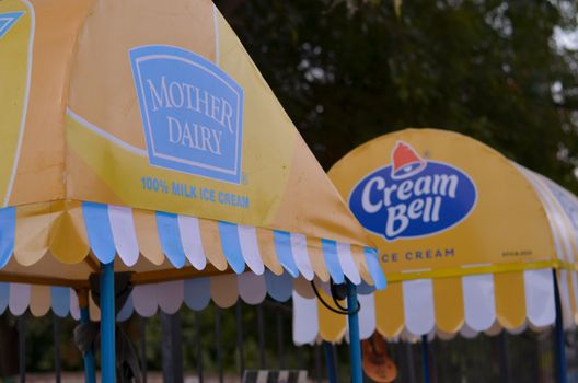 New Delhi, India, 2020. Cream Bell and Mother Dairy Ice cream stalls near India gate in Delhi. A central spot for tourists and locals, most people go out to eat ice cream in the evening.