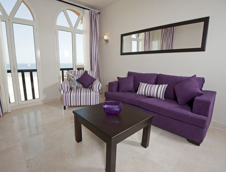 Interior design of a luxury apartment living room with a sea view