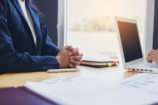 Business woman signing a loan for investment, negotiation