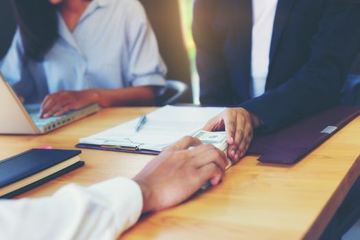 Business woman signing a loan for investment, negotiation