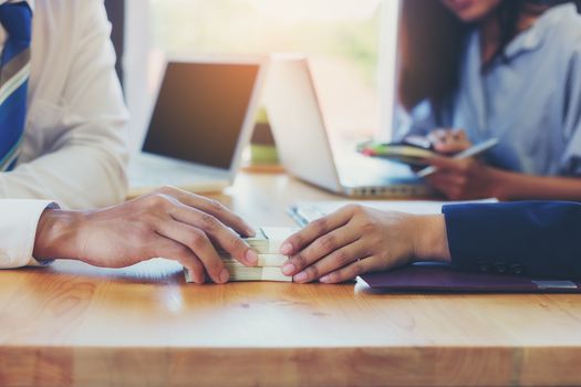 Business woman signing a loan for investment, negotiation