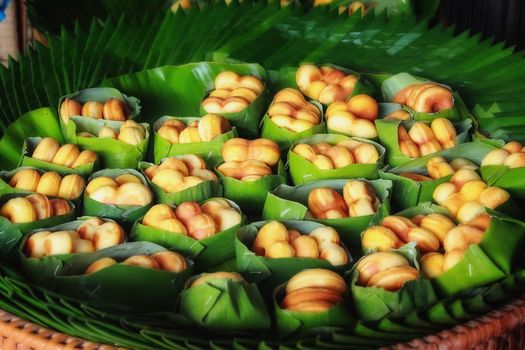 Thai dessert - wrapped in banana leaves