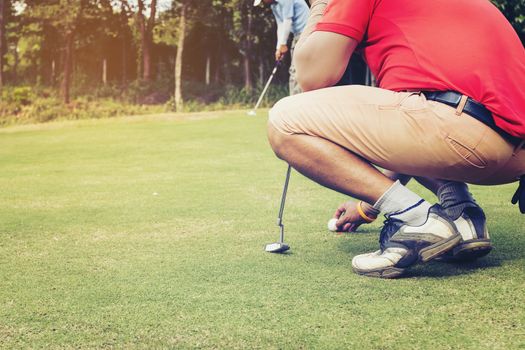 The goalkeeper was looking for a putt to score during the match.