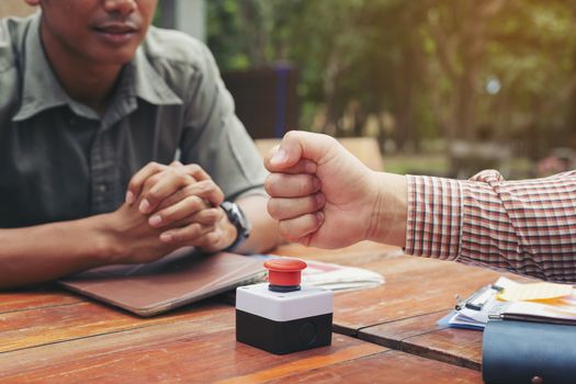 Young business men are negotiating with customers. And shake hands after the negotiations.