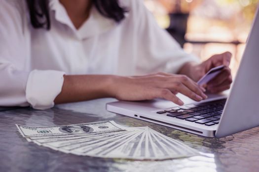 Young woman with credit card payment from shopping online