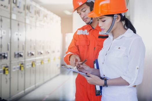 Executives and Electrical Engineers are checking the electrical equipment for their readiness.