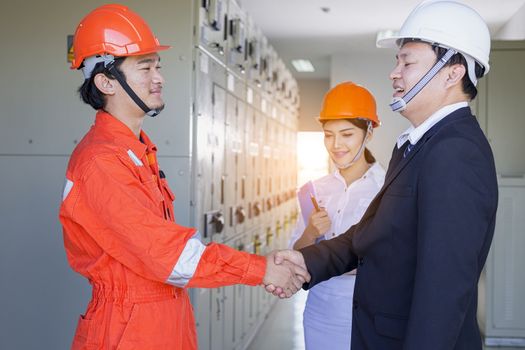 Executives and Electrical Engineers are checking the electrical equipment for their readiness.