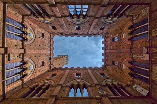 The Palazzo Comunale building was constructed around 1300, and is used today as the town hall of the city of Siena, Italy.