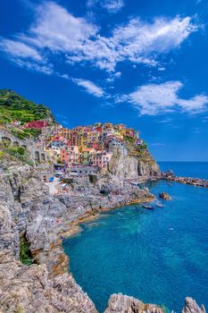 Manarola, Cinque Terre - July 9, 2018:. Manarola is a beautiful small town in the province of La Spezia, Liguria, north of Italy and one of the five Cinque terre travel attractions to tourists.