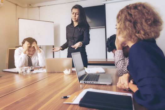 Business leader presenting new project. Businessman standing and leading business presentation. Male executive putting her ideas during presentation in conference room. 