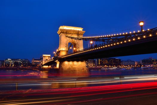 Traffic on Szechenyi Chain bridge over Danube river, Budapest city, Hungary.