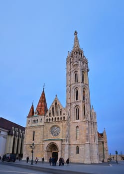 Budapest, Hungary - March 27, 2018: Matthias Church is a Roman Catholic church located in Budapest, Hungary, in front of the Fisherman's Bastion at the heart of Buda's Castle District.