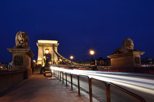 Traffic on Szechenyi Chain bridge over Danube river, Budapest city, Hungary.