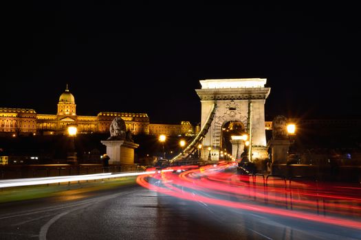 Traffic on Szechenyi Chain bridge over Danube river, Budapest city, Hungary.