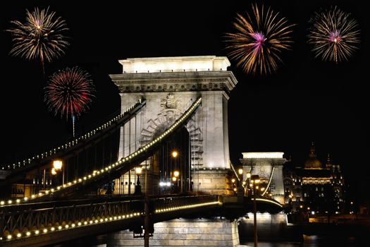 Szechenyi Chain bridge with fireworks, Budapest city, Hungary.