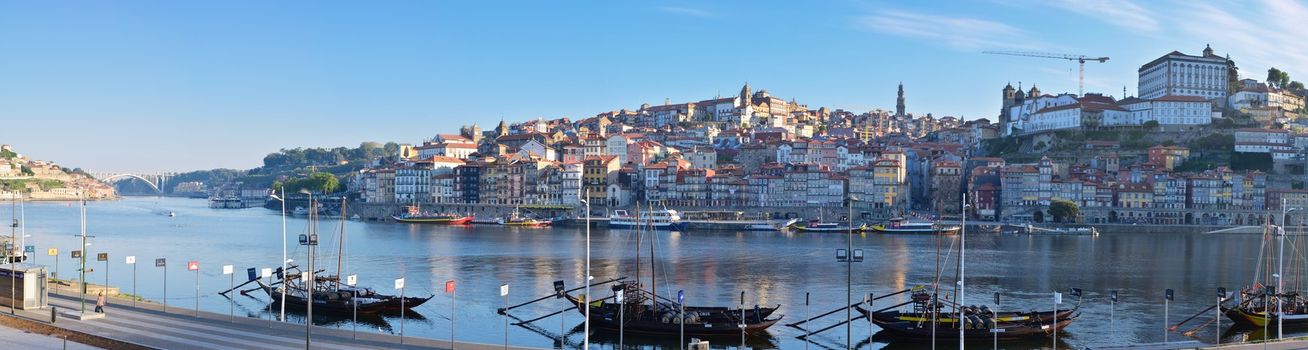 Porto, Portugal - May 19, 2018: Porto, old town skyline with the Douro river and rabelo boats. Is the second largest city in Portugal after Lisbon and famous by Porto wine.