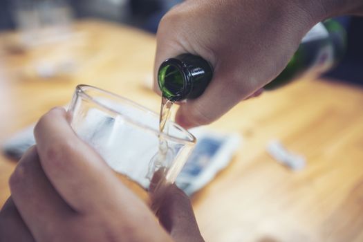 Business people are drinking to celebrate the success of their work.