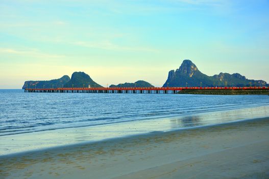 Red bridge that extends to the sea, Saran Withi Bridge Is an important tourist destination of Prachuap Khiri Khan Province, Thailand.