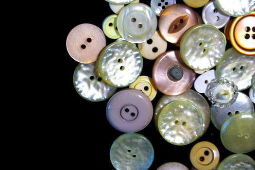 A Collection of Multicolour Different Size Buttons