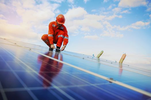 Engineers are checking the solar panel for maintenance. And clean the solar panel is always available.