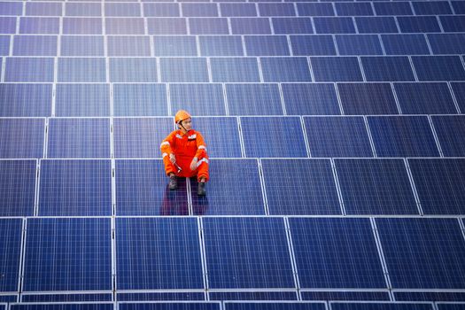 Engineers are checking the solar panel for maintenance. And clean the solar panel is always available.